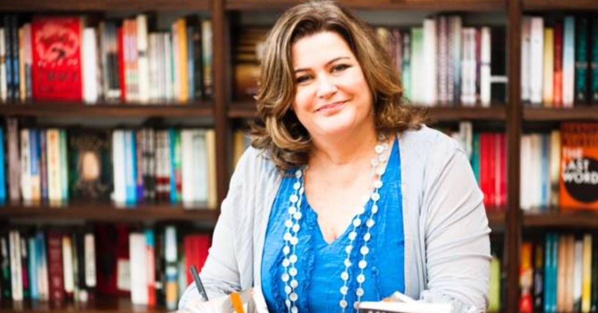 Alison Botha smiles for a photograph in a bookstore