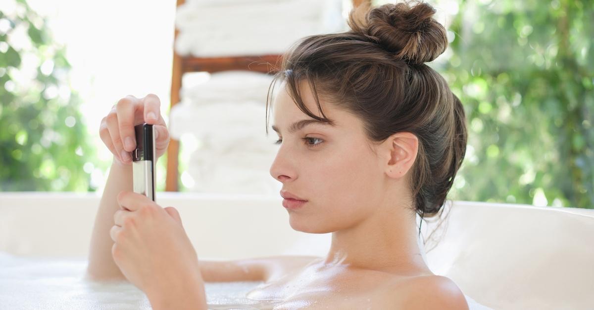 A young woman texting