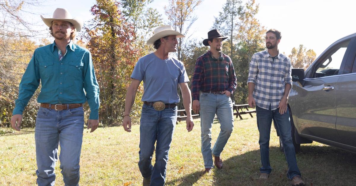 Nathan, Ty, Mitchell, and Brandon walk together on the farm on Farmer Wants a Wife