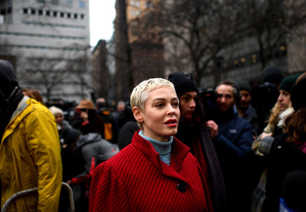 Rose McGowan in a red coat