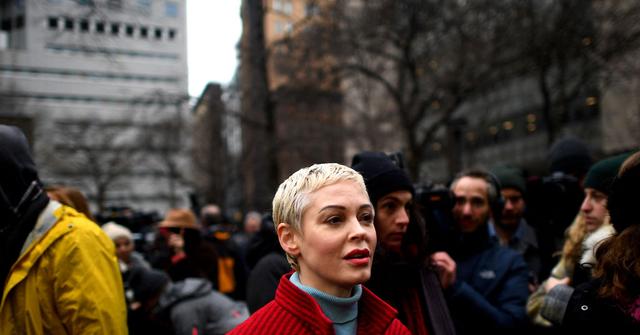 Rose McGowan in a red coat