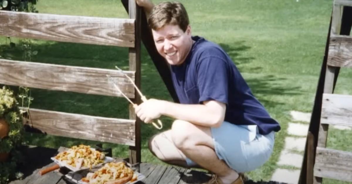 John Yelenic grilling in his backyard