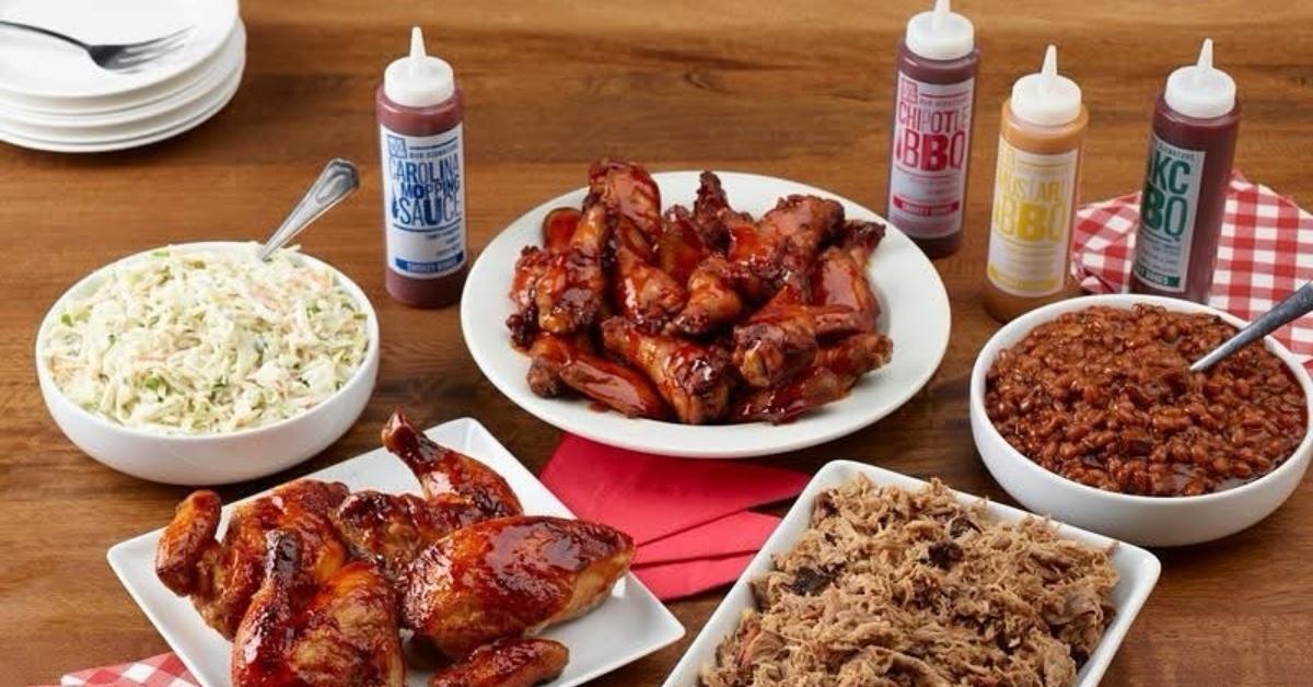 A spread of food and sauces from Smokey Bones.