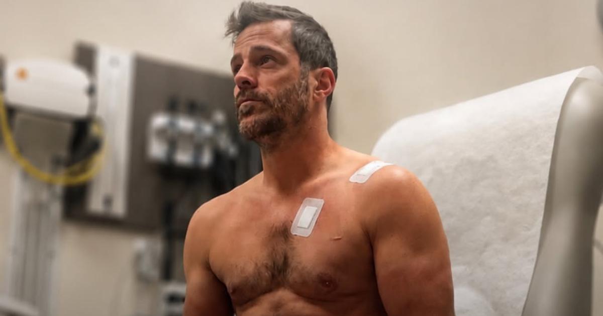 Ken McNickle in a hospital room.