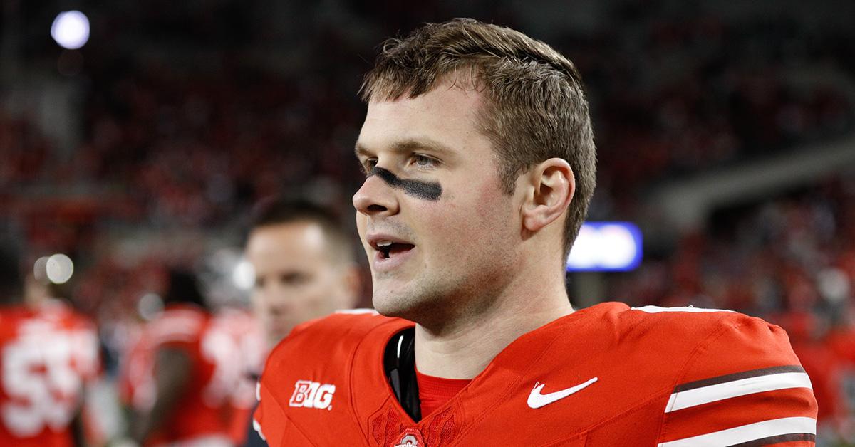 Kyle McCord ion the sideline of an Ohio State game with no helmet. 