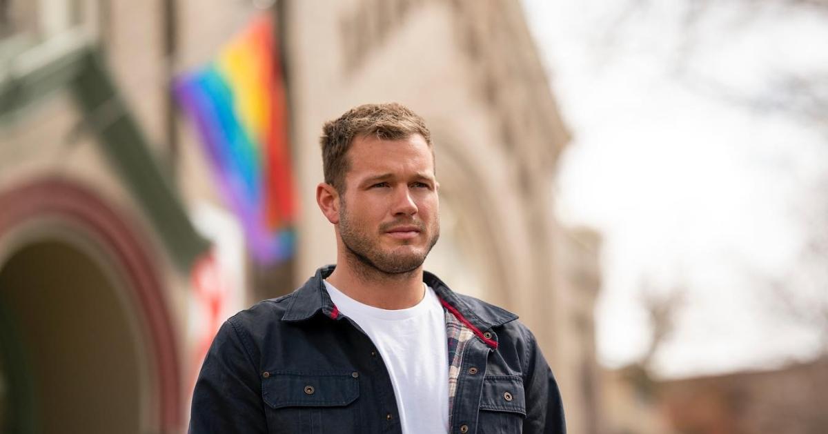 Colton Underwood with Pride flag