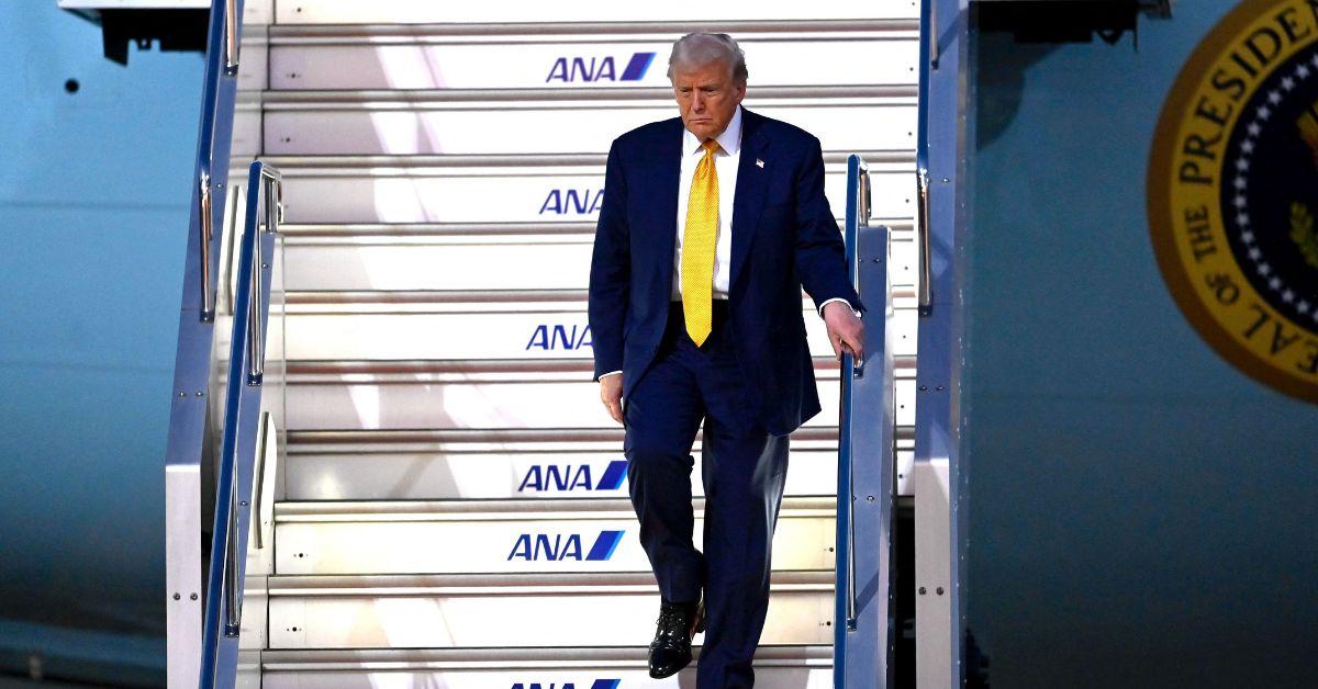 Donald Trump leaving Air Force One in Japan.