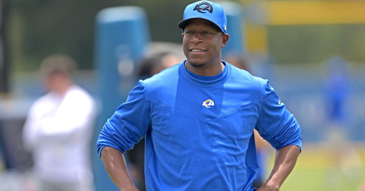 Defensive coordinator Raheem Morris of the Los Angeles Rams walks on the field during mini-camp at California Lutheran University on June 13, 2023 in Thousand Oaks, Calif.