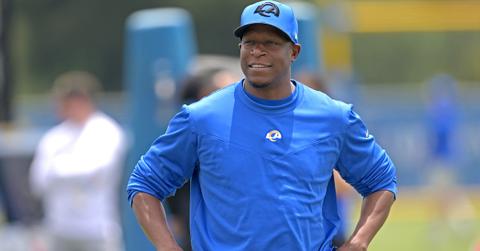 Defensive coordinator Raheem Morris of the Los Angeles Rams walks on the field during mini-camp at California Lutheran University on June 13, 2023 in Thousand Oaks, Calif.