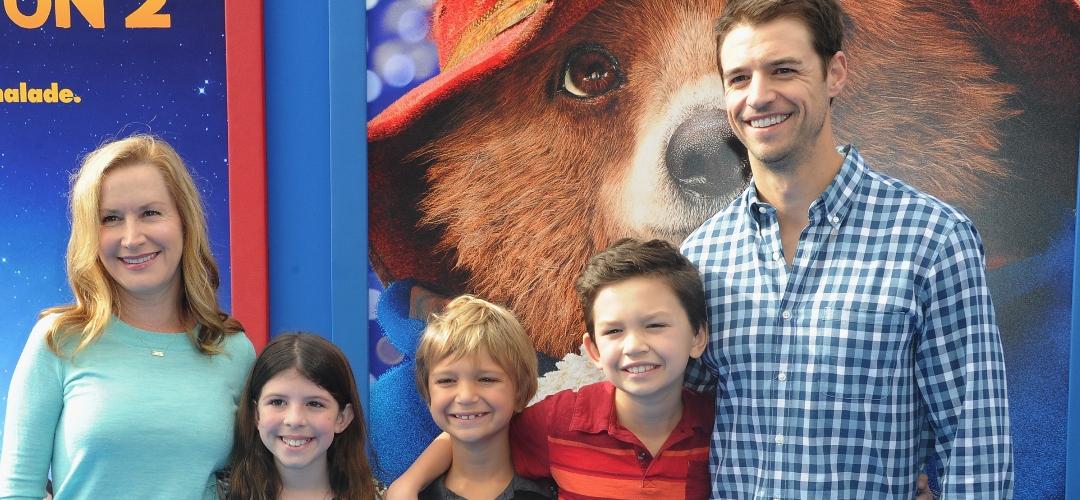 Angela Kinsey, Joshua Snyder and children arrive for the premiere of Warner Bros. Pictures' "Paddington 2" held at Regency Village Theatre on January 6, 2018