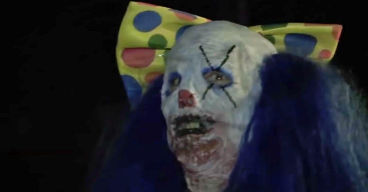 creepy clown with blue hair from 'the houses october built'