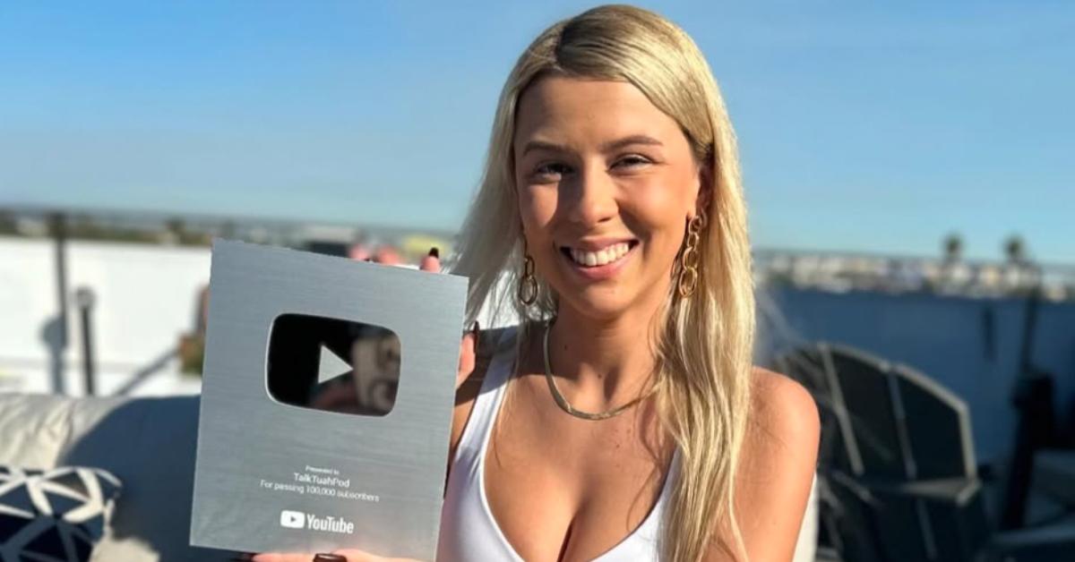 Haliey Welch holds up her YouTube award