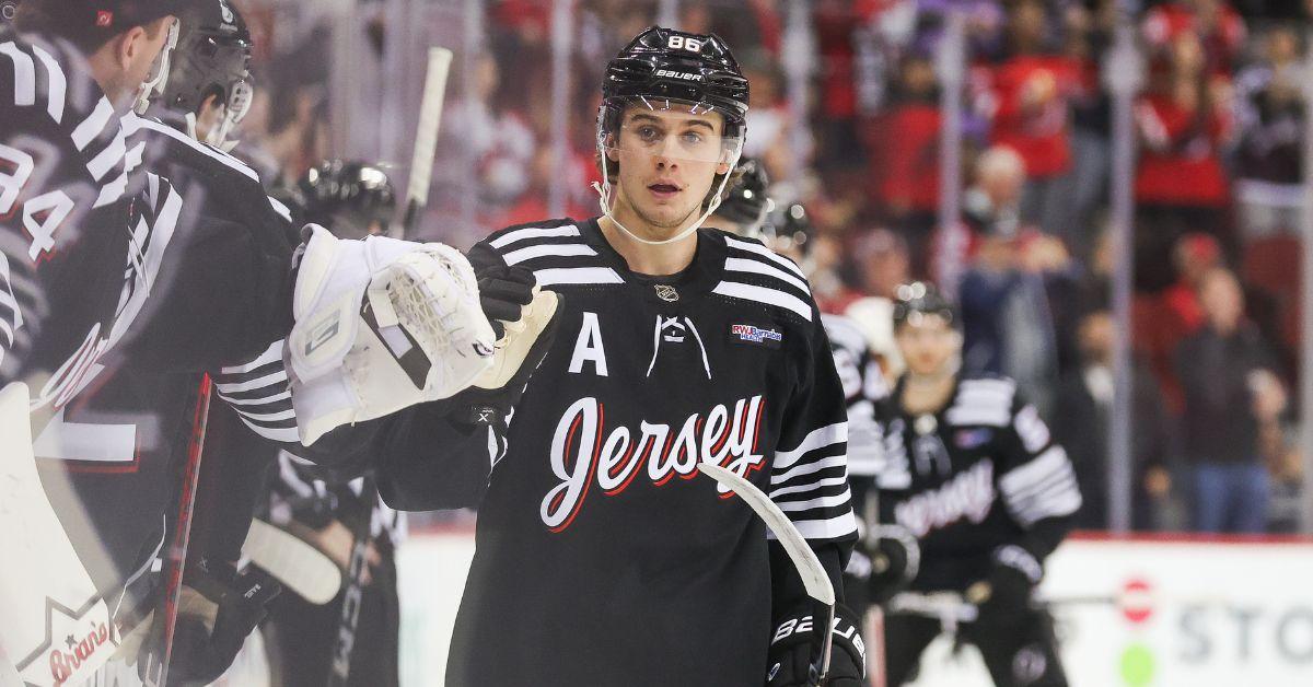 New Jersey Devils center Jack Hughes #86 celebrates after scoring a goal during a game between the Nashville Predators and New Jersey Devils