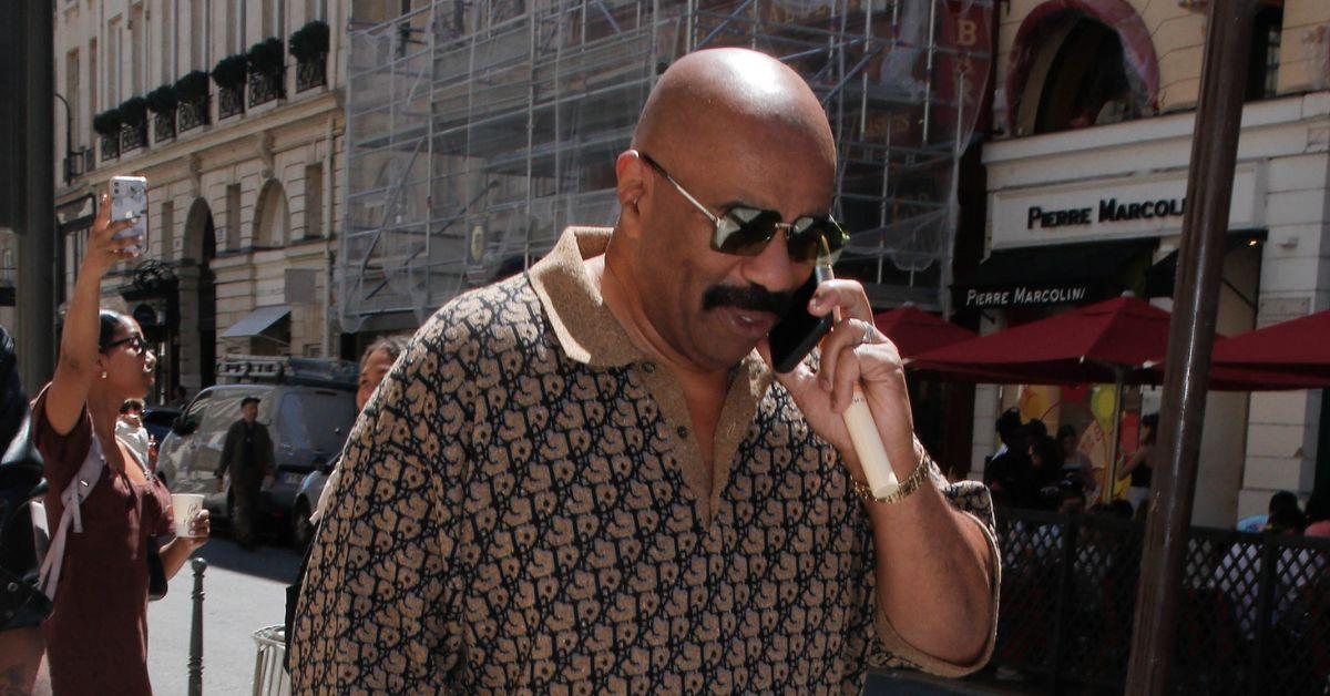 Steve Harvey on the phone in New York City. 