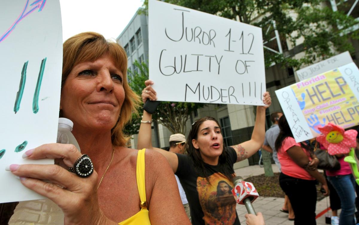 People protest the Casey Anthony verdict outside of the Orange County Courthouse on July 7, 2011