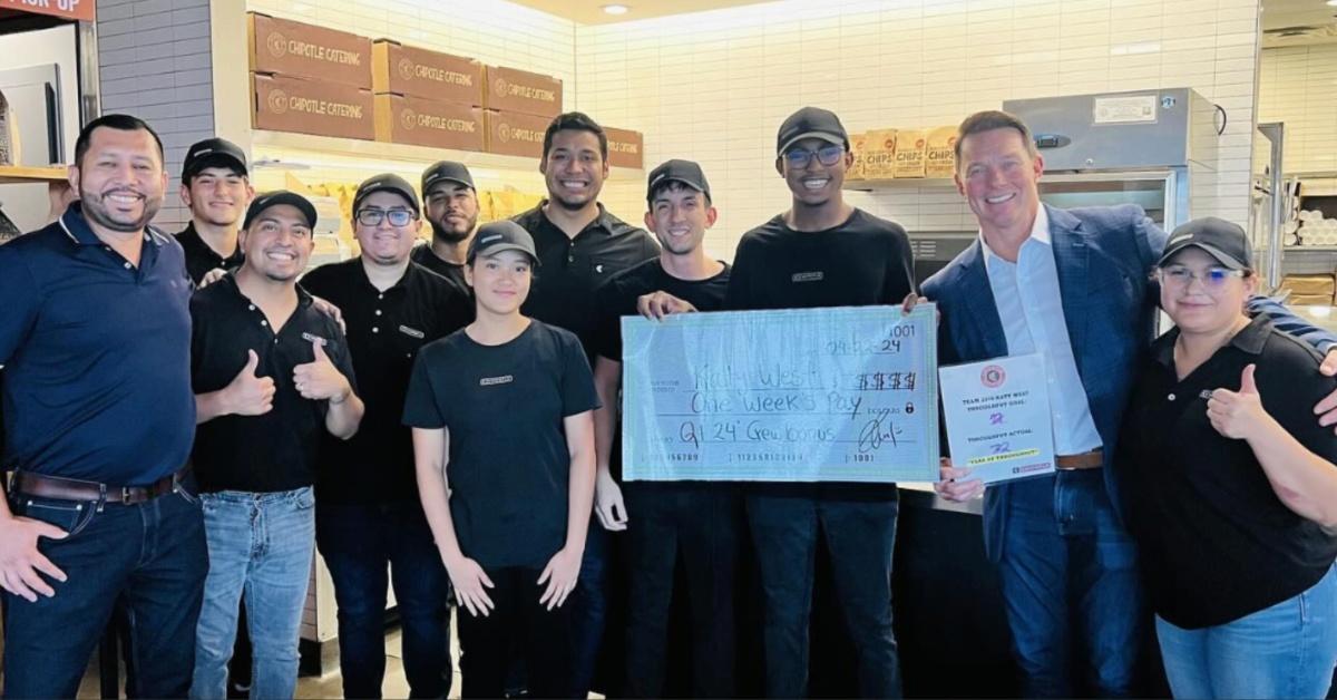 Scott Boatwright with Chipotle employees. 