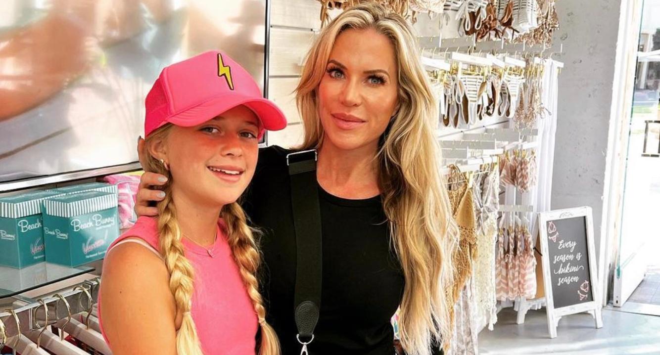 Jennifer poses with her daughter at the Beach Bunny Swimwear store