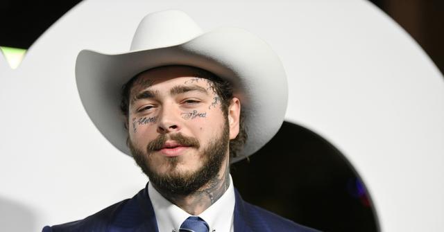 Post Malone arrives at the 2019 GQ Men Of The Year event at The West Hollywood Edition on Dec. 5, 2019