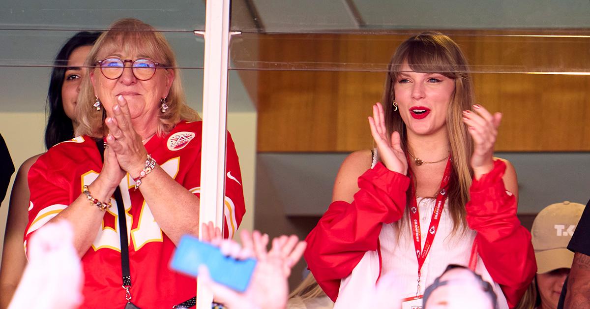 Taylor Swift and Donna Kelce applauding together at the Kansas City Chiefs vs. Chicago Bears game. 