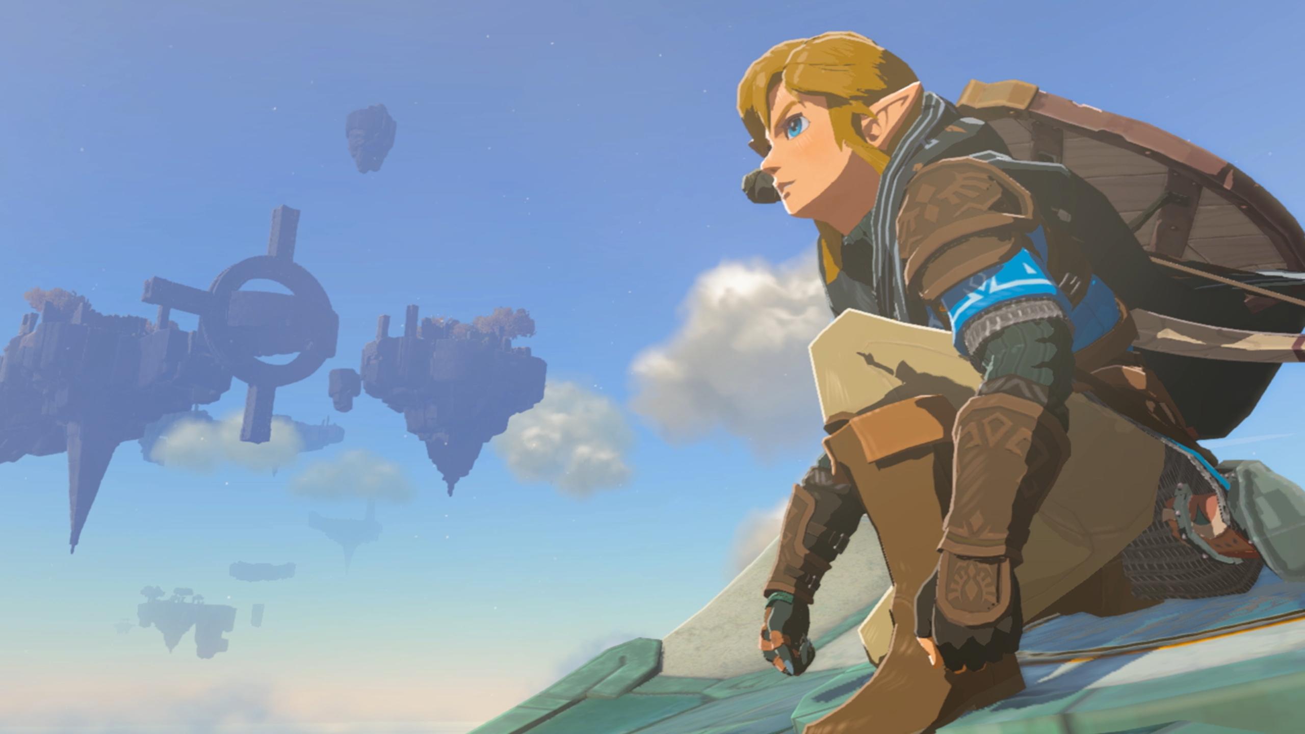 'Tears of the Kingdom' Link gliding on top of a Zonai Wing through the sky.