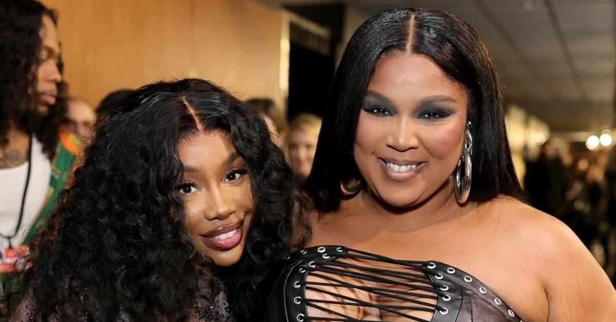 (l-r): SZA and Lizzo smiling at an event