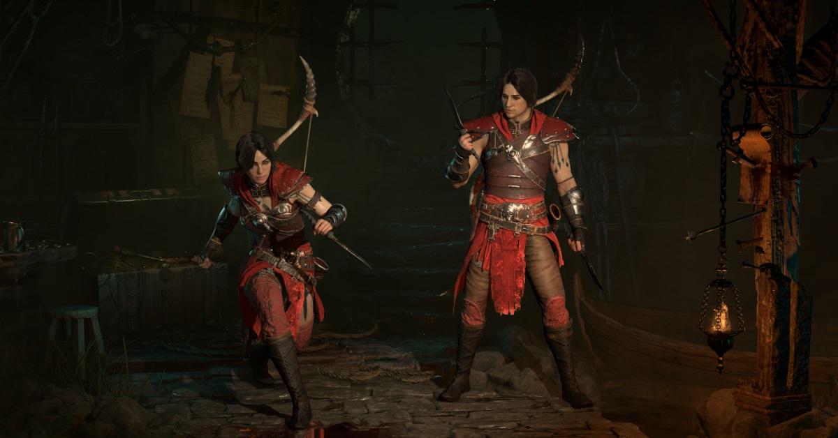 Two rogues posing in Diablo IV.