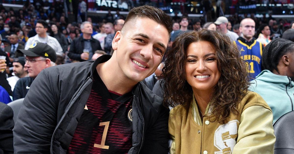 André Murillo and Tori Kelly attend a basketball game