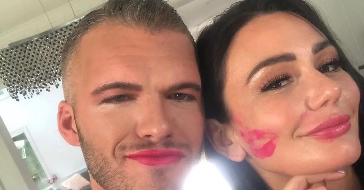 Jwoww and  Zack Carpinello posing with a lipstick stain on Jwoww's cheek