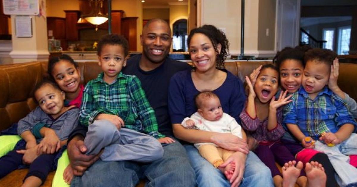 (l-r): Shaun Alexander with his wife, daughter Torah, and other children