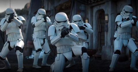 A group of Stormtroopers aiming at their enemies in 'The Mandalorian.'