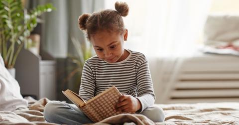 Young woman reading books