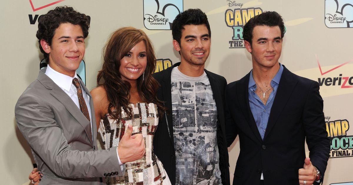 (l-r): Nick Jonas, Demi Lovato, Joe Jonas, and Kevin Jonas at the 'Camp Rock 2' premiere.