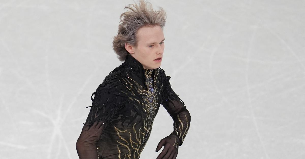 Quad God competing during the men's singles figure skating event at the 2026 Winter Olympics