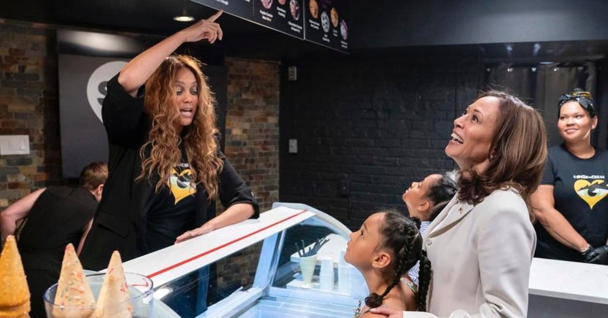 Tyra Banks serves ice cream to Kamala Harris.