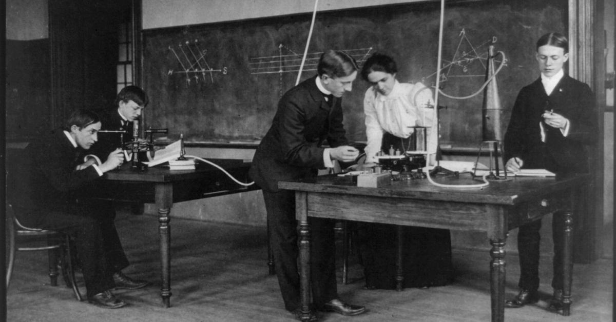 Students in a science class conducting experiments, Western High School, Washington, D.C., (1899?)