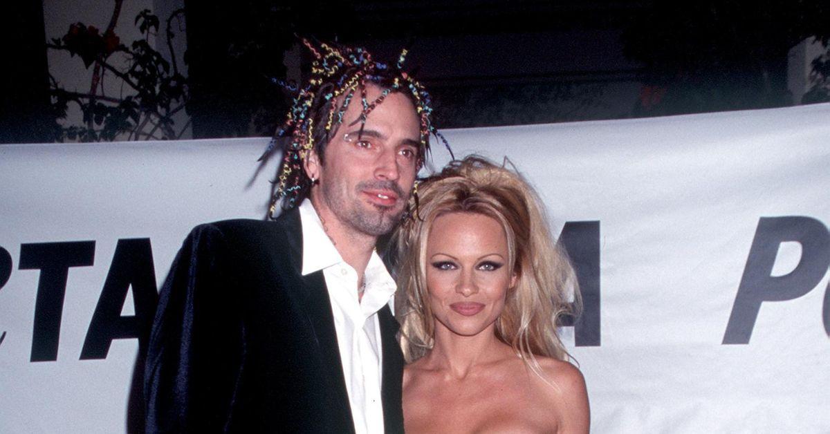 (l-r): Tommy Lee and Pamela Anderson attending a red carpet event.