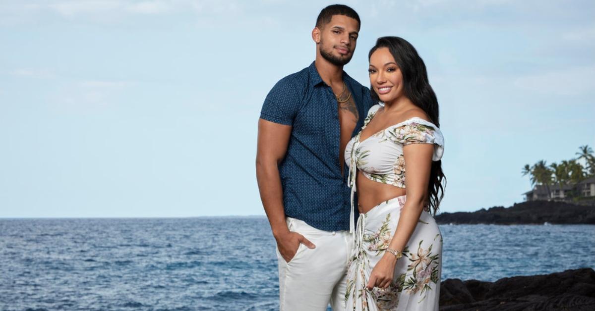 Roberto and Vanessa stand in front of the ocean on Temptation Island