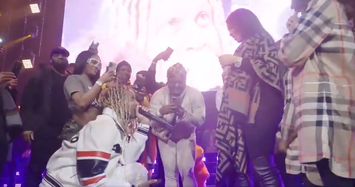 Lil Durk proposes during concert