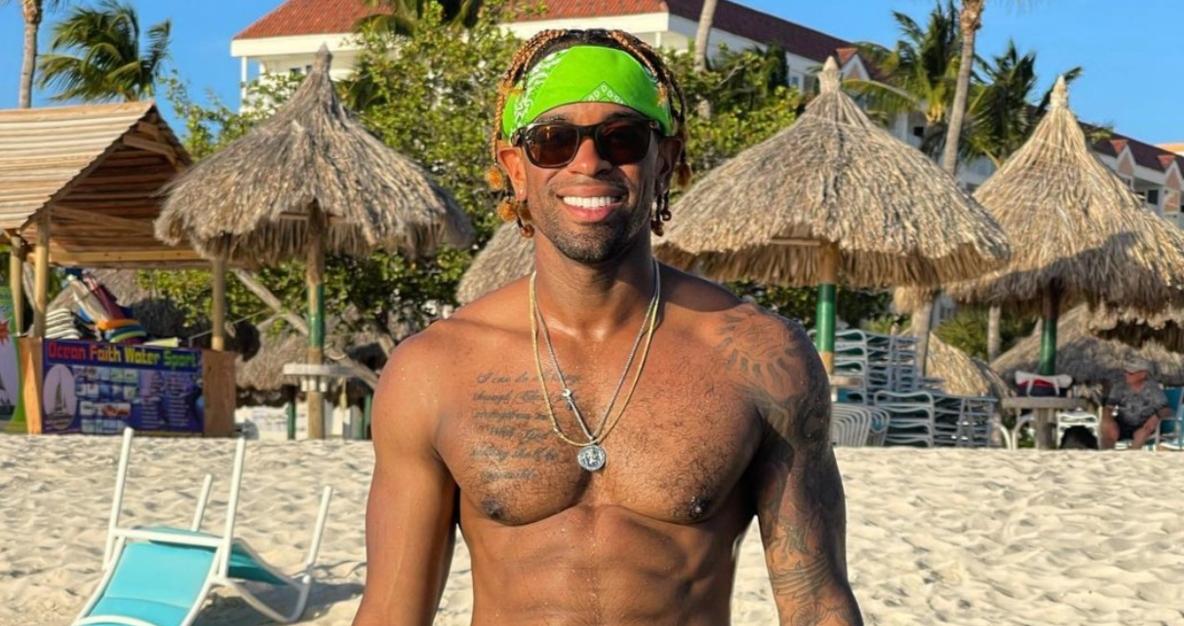 ‘Temptation Island’ Season 5 star Christopher poses for an Instagram photo on the beach