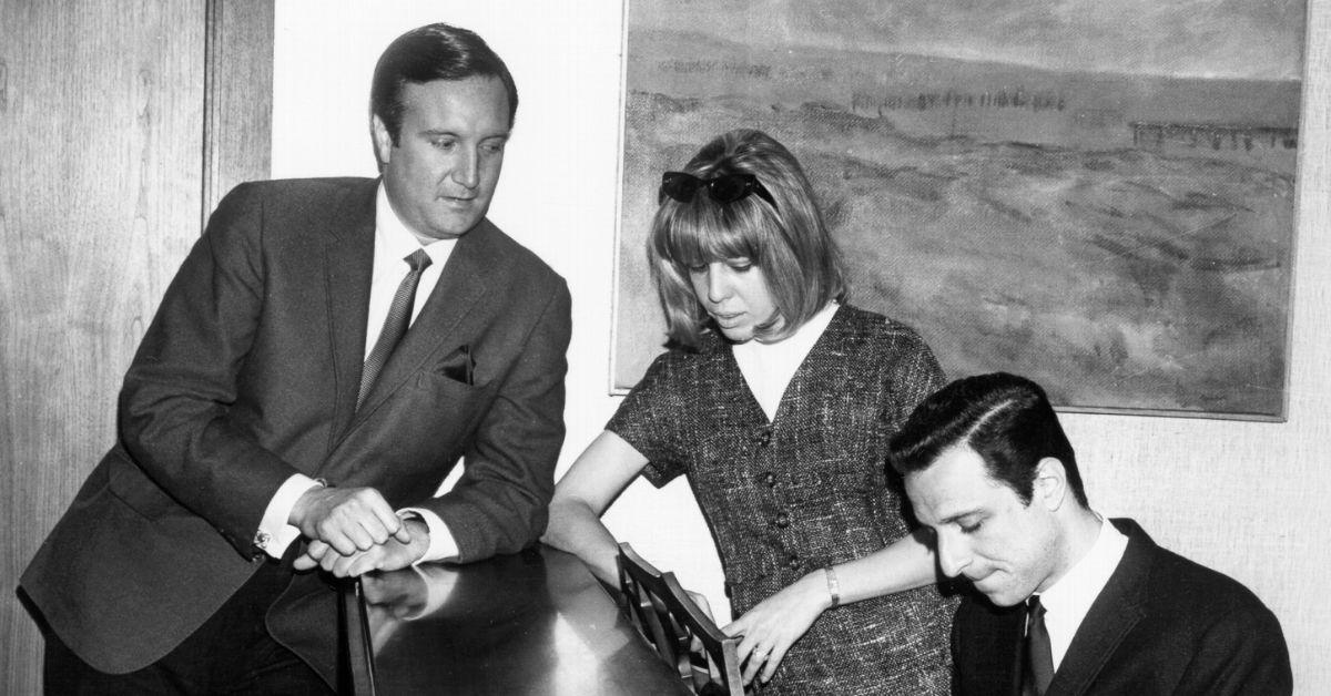 Don Kirshner stands at the piano with Cynthia Weil and Barry Mann in 1962