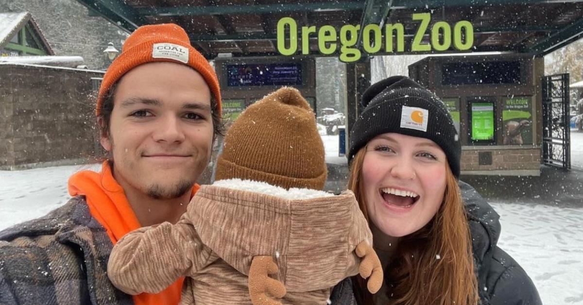 Jacob Roloff, his wife, and their son visiting the Oregon Zoo on a snowy day.