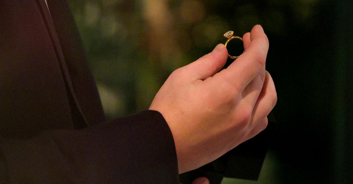 A man holds an engagement ring during Season 8 of 'Love Is Blind.'