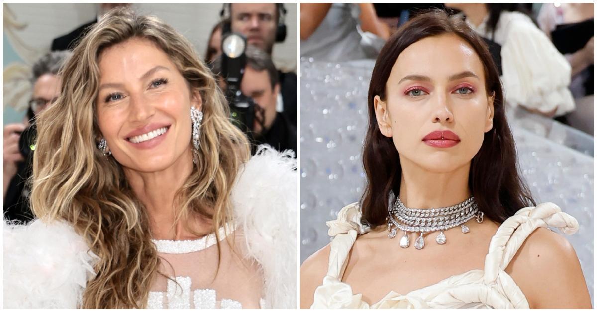 Gisele Bundchen and Irina Shayk pose in white dresses at the 2023 Met Gala Celebrating "Karl Lagerfeld: A Line Of Beauty".
