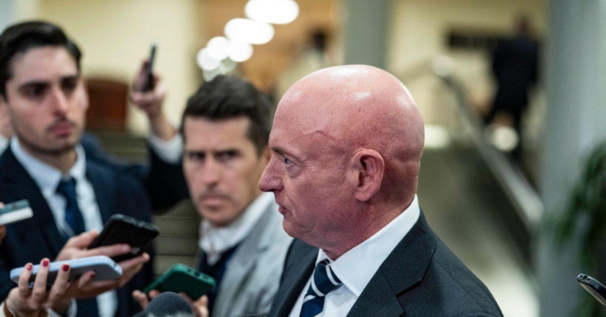 Mark Kelly speaking at a press gaggle in June of 2025.