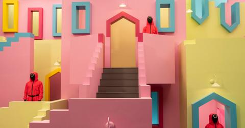 Workers standing guard during 'Squid Game: The Challenge.'