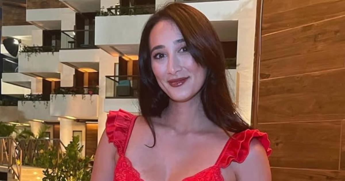 Jill Chin wearing a red dress.