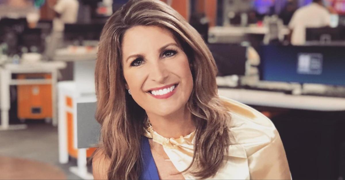 Cheryl Preheim poses for a picture at 11 Alive News.