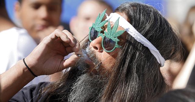 man smoking cannabis