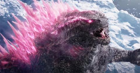 Godzilla in pink with ice behind him.