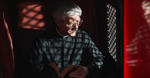 priest in confessional